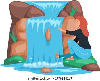 Woman sits next to rock and waterfall enjoys wonderful natural place with clean nature, tropical river and beautiful waterfall in mountains landscape with plants and rocks. Green wood with wild lake