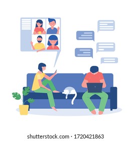 Woman sits on sofa at home, holding smartphone and make videoconferencing. Man sits on sofa and work on laptop and chattind in messenger or social network. Cat lays on sofa. People's communication