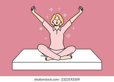 Woman sits on soft mattress and yawns getting ready for healthy sleep furniture concept. Girl in pajamas wakes up with good mood using orthopedic mattress for comfortable night rest