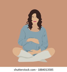 The woman sits and rejoices at her pregnancy.