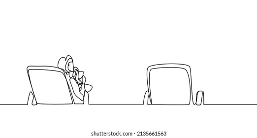 a woman sitting alone on one of the beach sunbeds and an empty sunbed next to her