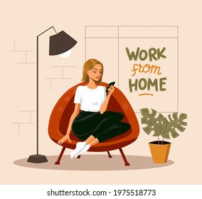 Woman sitting in the chair looking at smartphone