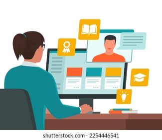 Woman sitting at desk and connecting with her computer, she is taking online classes, e-learning and online courses concept