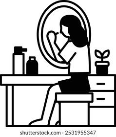 A woman is sitting at a desk with a mirror in front of her