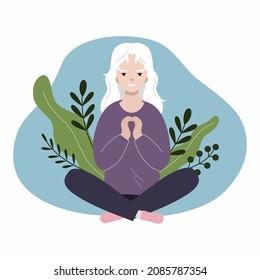Woman is sitting in lotus position. Albino girl holds her hands in shape of heart. Love yourself.