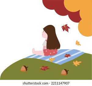 woman sitting in the middle of autumn scenery
