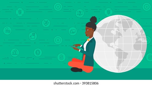 Woman sitting near globe.