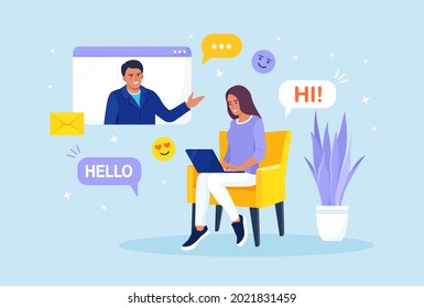 Woman is sitting on armchair and using laptop for video call with boy friend or colleague. Friends talking online. Online education and e-learning. Social media or Dating app and virtual relationship