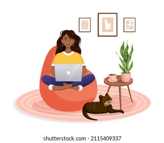 Woman is sitting on a bean bag chair at home at a laptop computer. Remote work, office at home, programming, freelance. Study at home in quarantine. Vector illustration. Cozy interior with a cat