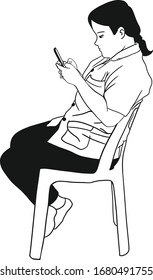Woman sitting on a chair while using a cell phone.