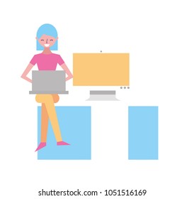 woman sitting on desk with her laptop and computer