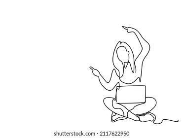 woman sitting on floor with laptop on her lap pointing fingers to side