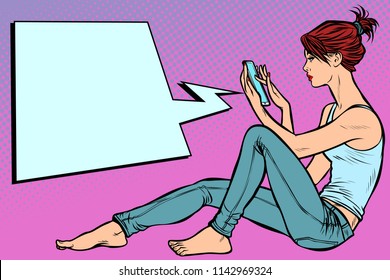 Woman sitting on the floor and reading smartphone. Pop art retro vector illustration kitsch vintage