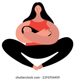 A woman is sitting on the floor with a small child in her arms
