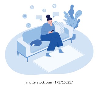 A woman sitting on the sofa and a cat sleeping