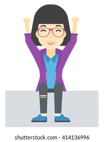 Woman sitting with raised hands up.