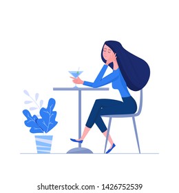 Woman sitting at the table in cafe and holding martini glass. Enjoying female character illustration in flat style