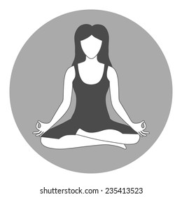 Woman sitting in yoga lotus position