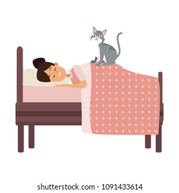 Woman sleeping in bed with cat