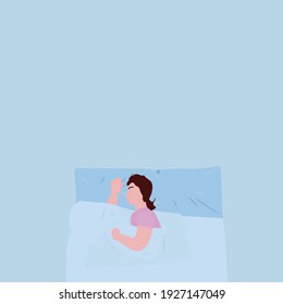 woman sleeps on a pillow on blue background
