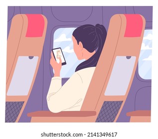 Woman with smartphone on airplane during flight