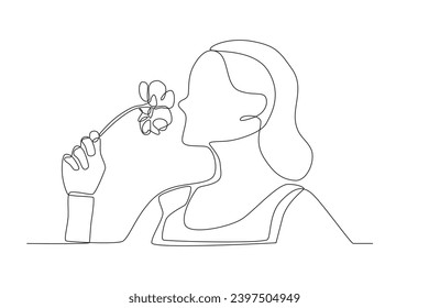 A woman smells flowers. Spring one-line drawing