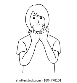 Woman smiling showing her pretty white smile pointing fingers at mouth