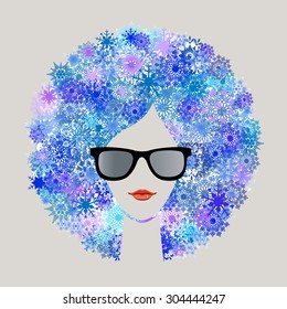 Woman with snowflake Afro hairdo winter season
