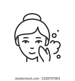 Woman soaps her face with foam, linear icon. Line with editable stroke