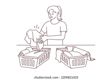 Woman sorting dirty clothes for washing. Girl gathering laundry in baskets in laundromat. Housework and housekeeping. Vector illustration. 
