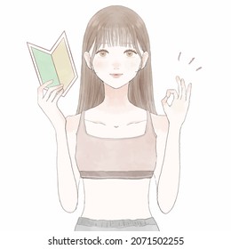 Woman in sportswear holding beginner mark. She's got an ok sign. On white background.