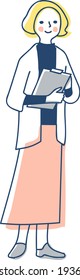 Woman standing with a binder