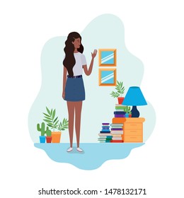 woman standing with bookshelf of wooden and books