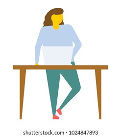 A woman standing by table and using laptop, flat vector icon 