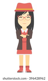 Woman standing with crossed arms.