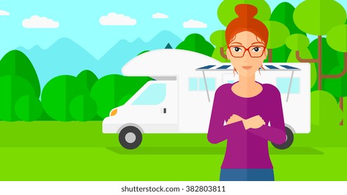 Woman standing in front of motor home.