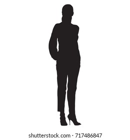 Woman standing with hands in pockets dressed in trousers and shirt. Isolated vector silhouette