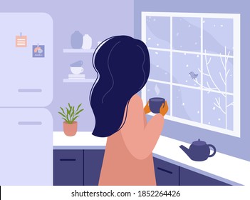 Woman standing in kitchen looking out window. Girl drinking hot tea or coffee at home, watching on winter landscape outside. Time for yourself, relax, slow down concept. Life style vector illustration