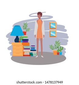 woman standing in the living room with books