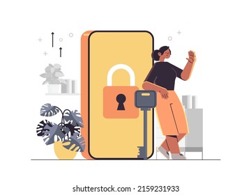 woman standing near locked smartphone with padlock mobile account privacy security concept full length