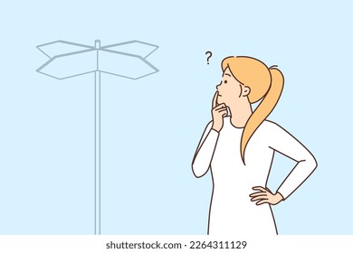 Woman is standing near road sign pointing in different sides and trying to choose direction. Concept choosing way to achieve goal or direction for development personal skills