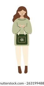 Woman standing with reusable tote bag. She is dressed in an oversized green sweater, cream-colored pants, with brown hair, eco-conscious shopping experience. Minimalist flat-style vector illustration.