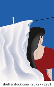 A woman stands behind a fluttering bedsheet hanging on a clothesline.