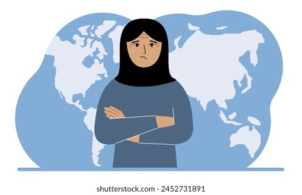 A woman stands in front of a world map with his arms crossed.