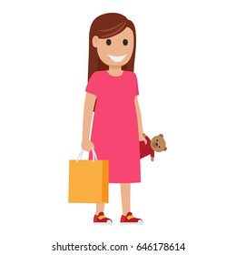 Woman stands and holds bag and toy-bear on white background. Family shopping day. Cartoon mother has fun during shopping at mall.  
