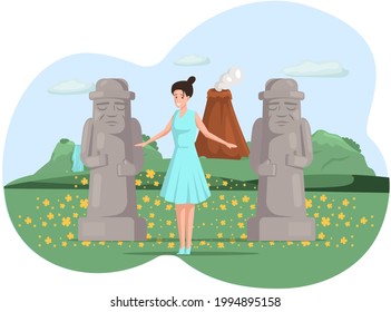 Woman stands near large statues, stone idols in nature landscape in mountaines. Traveler enjoy famous landmark in beautiful island in summer vacation. Tourist attraction of wonderful place of visit