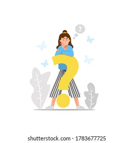 A woman stands on the big question mark