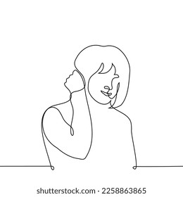 woman straightens her hair behind her ear smiling - one line drawing vector. concept shy woman before crash, shy person gets compliment