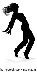 A woman street dance hip hop dancer in silhouette