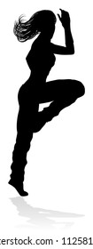 A woman street dance hip hop dancer in silhouette